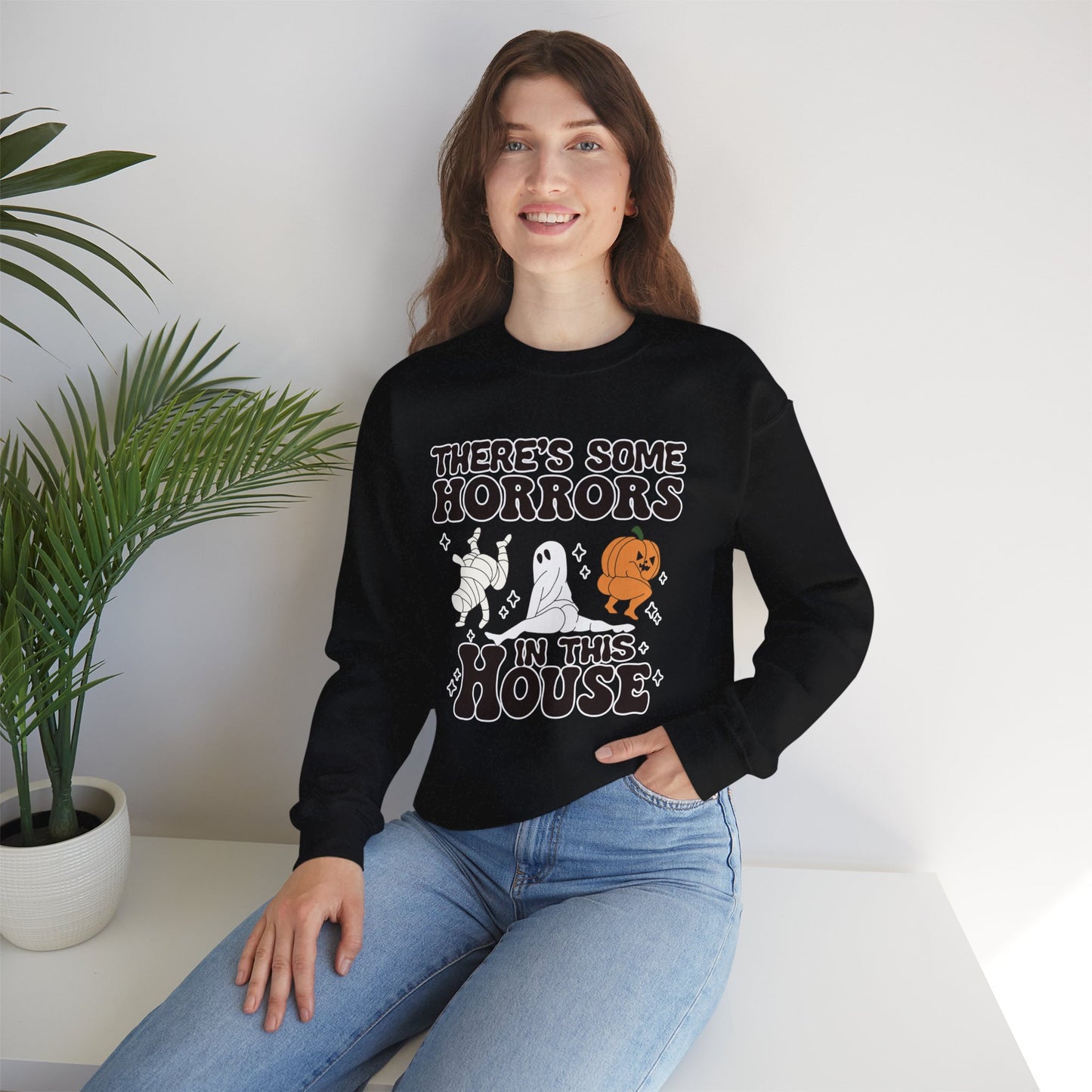 There's Some Horrors In This House Unisex Heavy Blend Crewneck Sweatshirt