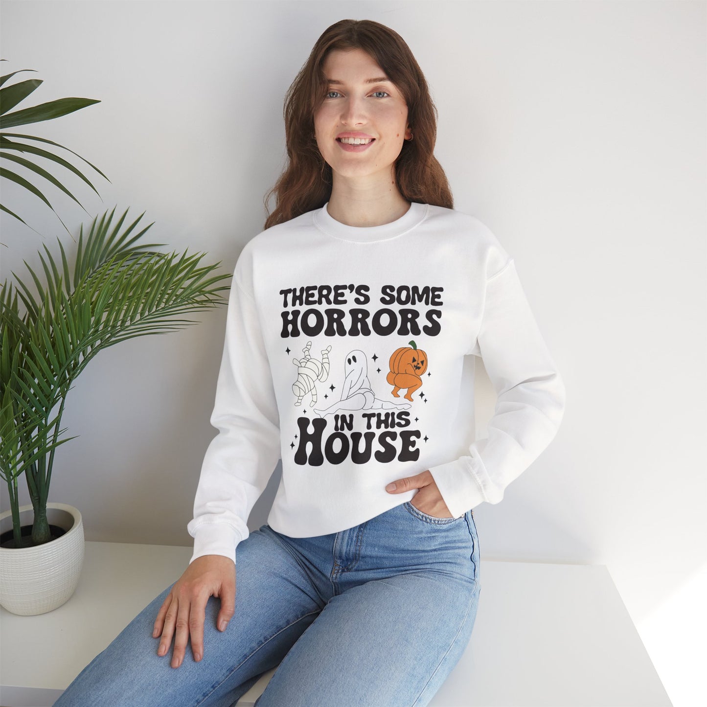 There's Some Horrors In This House Unisex Heavy Blend Crewneck Sweatshirt