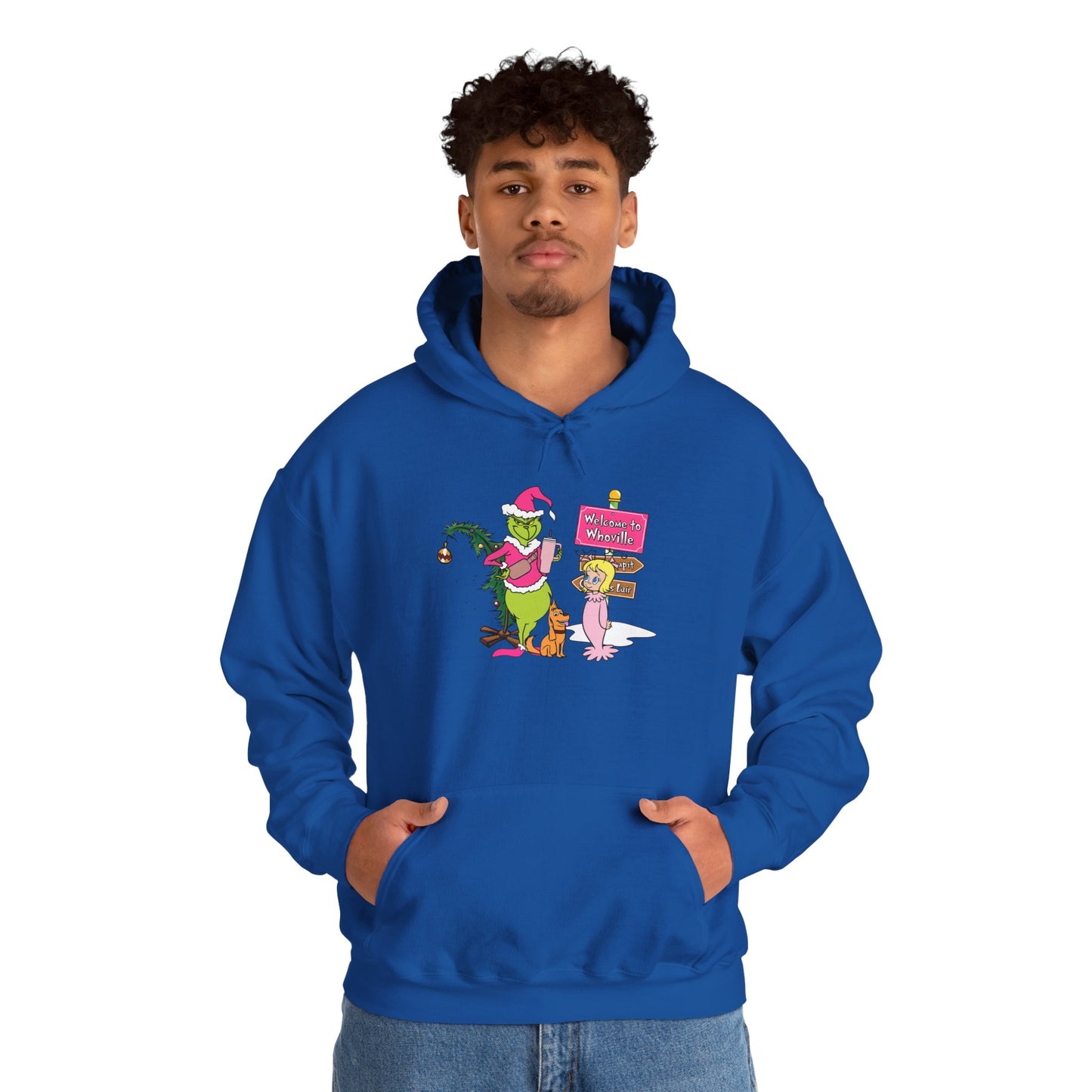 Welcome to Merryville Christmas Hoodie – Cute Green Creature & Winter Village Sweatshirt (Unisex)