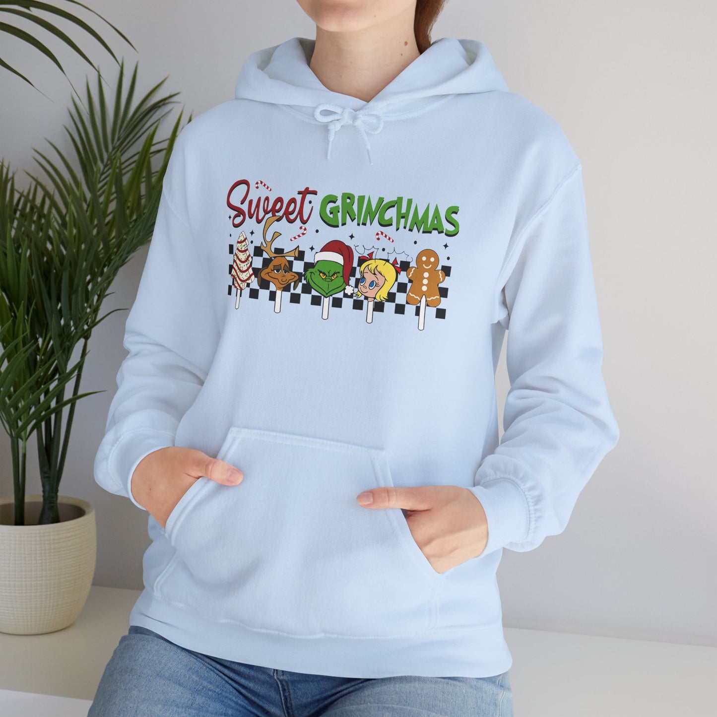 Sweet Grinchmas Candy Characters Funny Christmas Hoodie – Cute Holiday Treats Grinch-Inspired Unisex Heavy Blend Hooded Sweatshirt