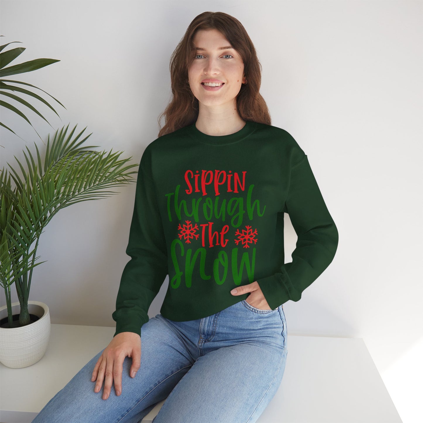 Sippin’ Through The Snow Sweatshirt – Festive Holiday Unisex Heavy Blend Crewneck