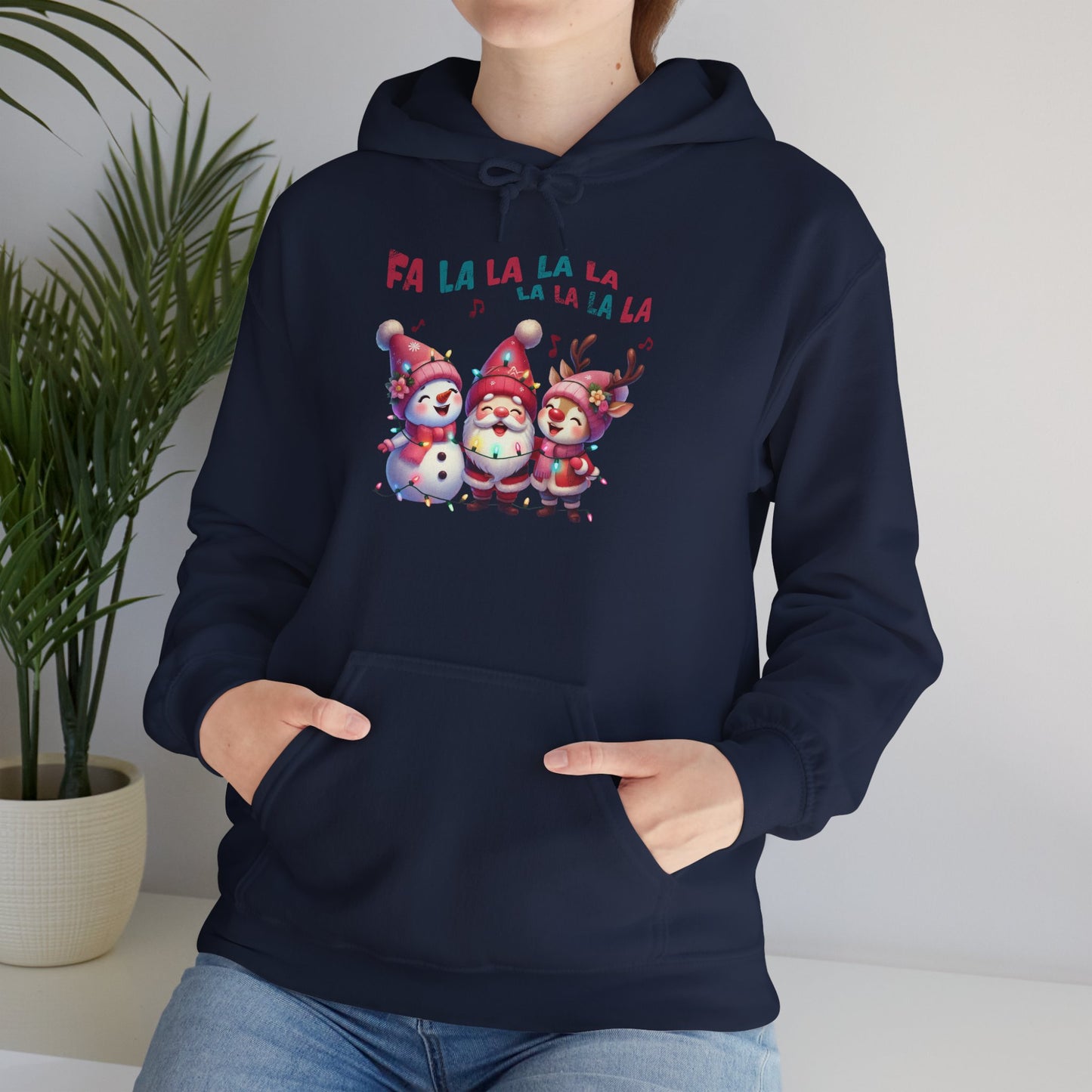 Festive Caroling Trio Christmas Hoodie – Cute Santa, Snowman & Reindeer Holiday Sweatshirt (Unisex)