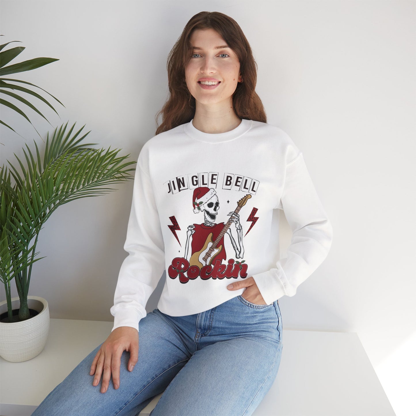 Jingle Bell Rockin’ Skeleton Christmas Rock Music Holiday Sweatshirt – Retro Guitar Santa Unisex Heavy Blend Crewneck