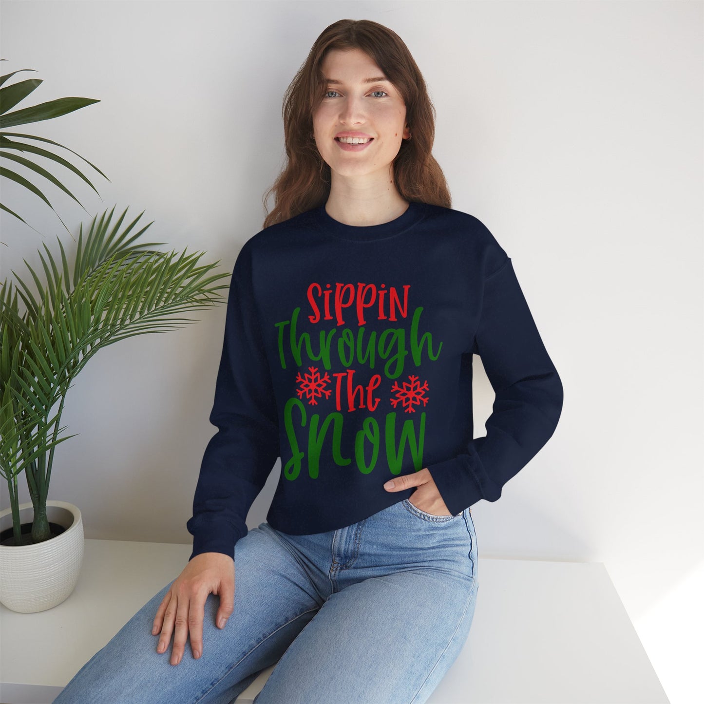 Sippin’ Through The Snow Sweatshirt – Festive Holiday Unisex Heavy Blend Crewneck