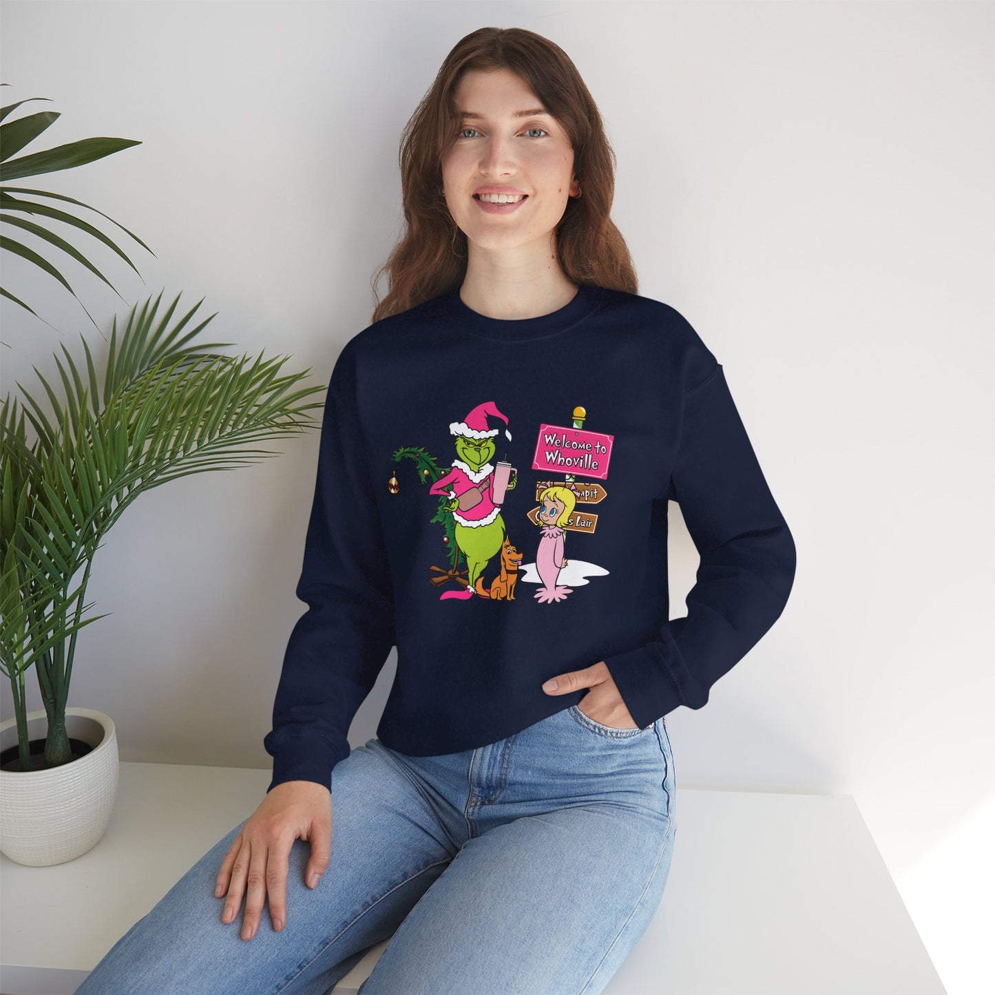 Welcome to Merryville Christmas Crewneck – Cute Green Creature & Winter Village Sweatshirt (Unisex)