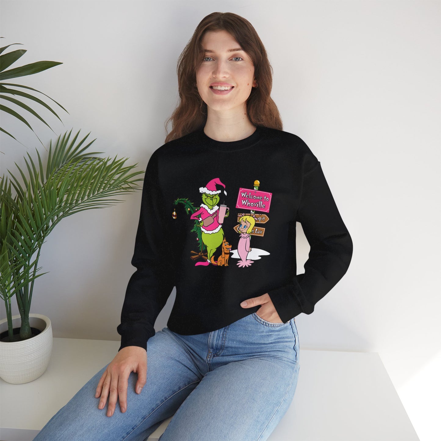 Welcome to Merryville Christmas Crewneck – Cute Green Creature & Winter Village Sweatshirt (Unisex)