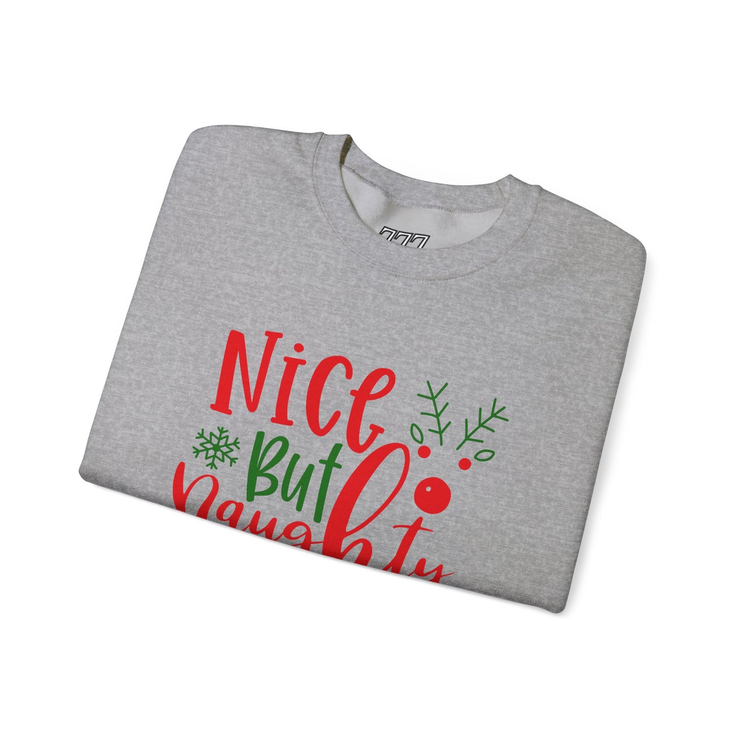 Nice But Naughty Sweatshirt – Cute & Sassy Christmas Unisex Heavy Blend Crewneck