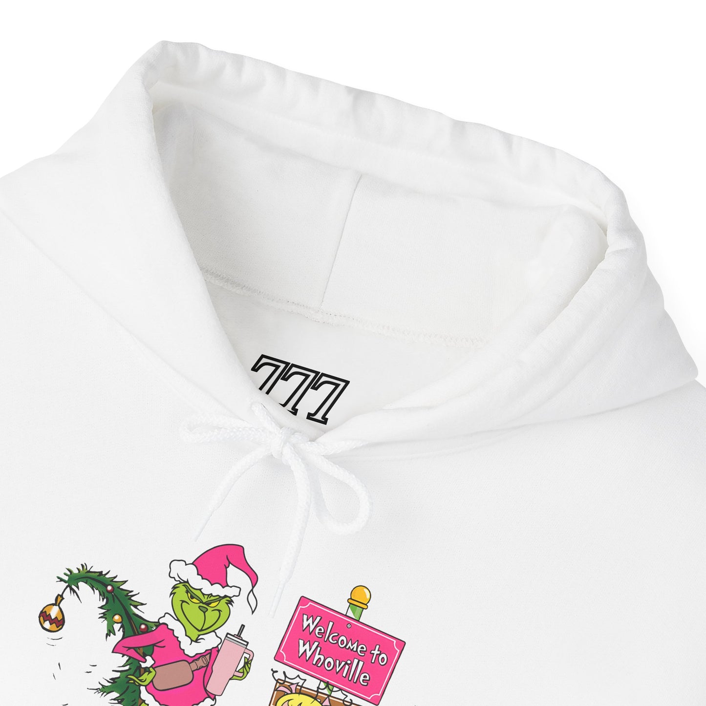 Welcome to Merryville Christmas Hoodie – Cute Green Creature & Winter Village Sweatshirt (Unisex)