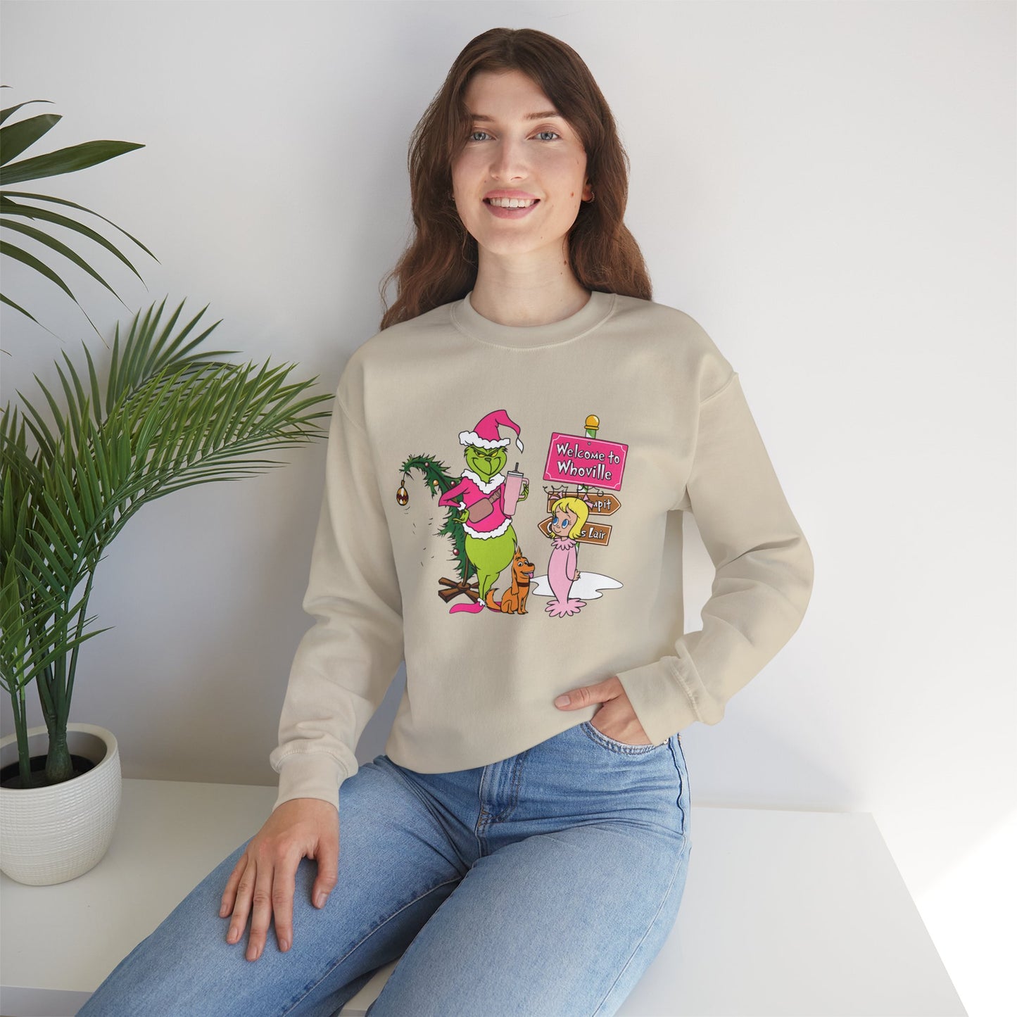 Welcome to Merryville Christmas Crewneck – Cute Green Creature & Winter Village Sweatshirt (Unisex)