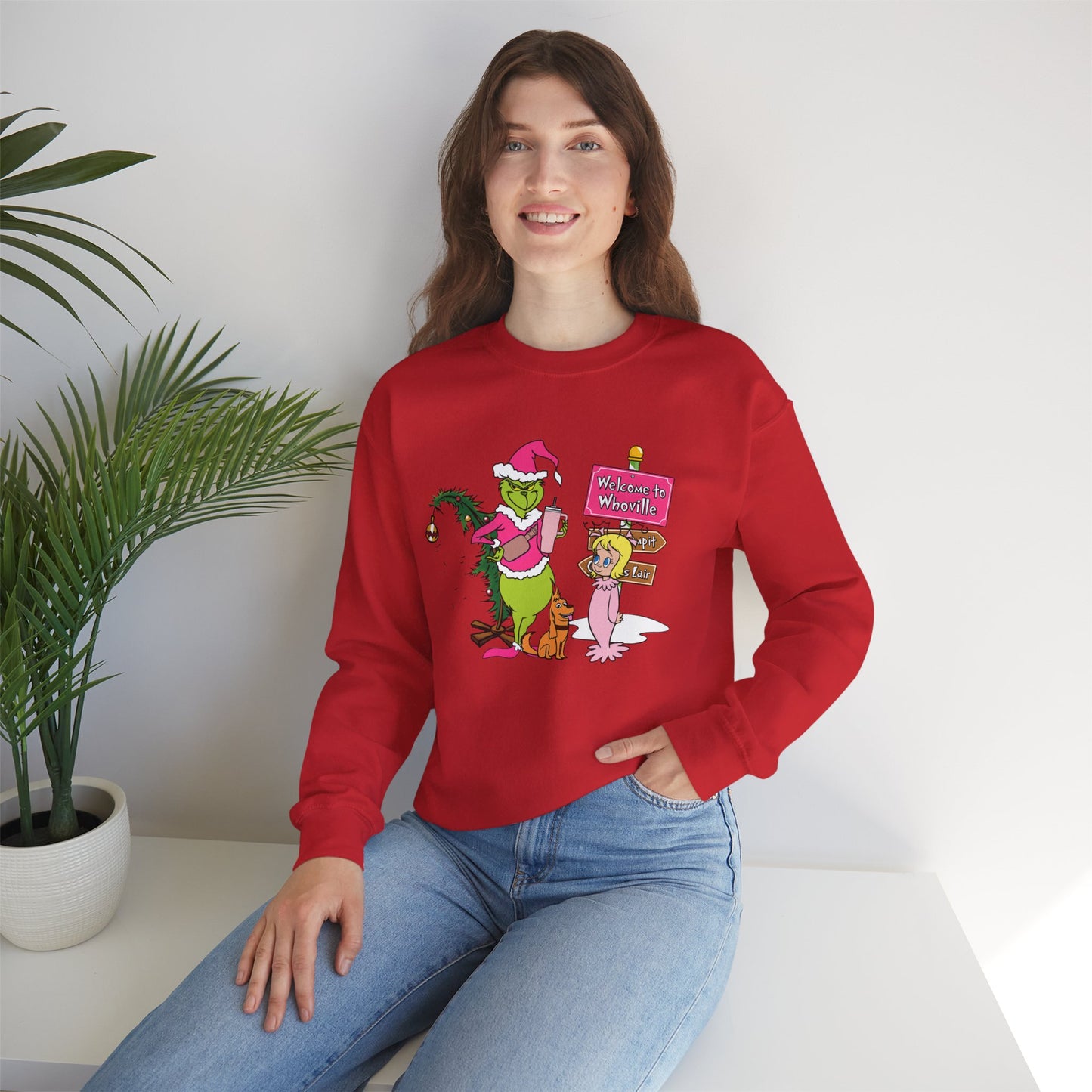 Welcome to Merryville Christmas Crewneck – Cute Green Creature & Winter Village Sweatshirt (Unisex)