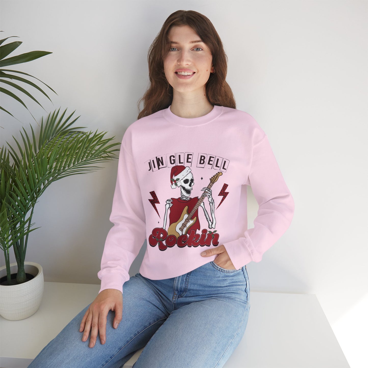 Jingle Bell Rockin’ Skeleton Christmas Rock Music Holiday Sweatshirt – Retro Guitar Santa Unisex Heavy Blend Crewneck