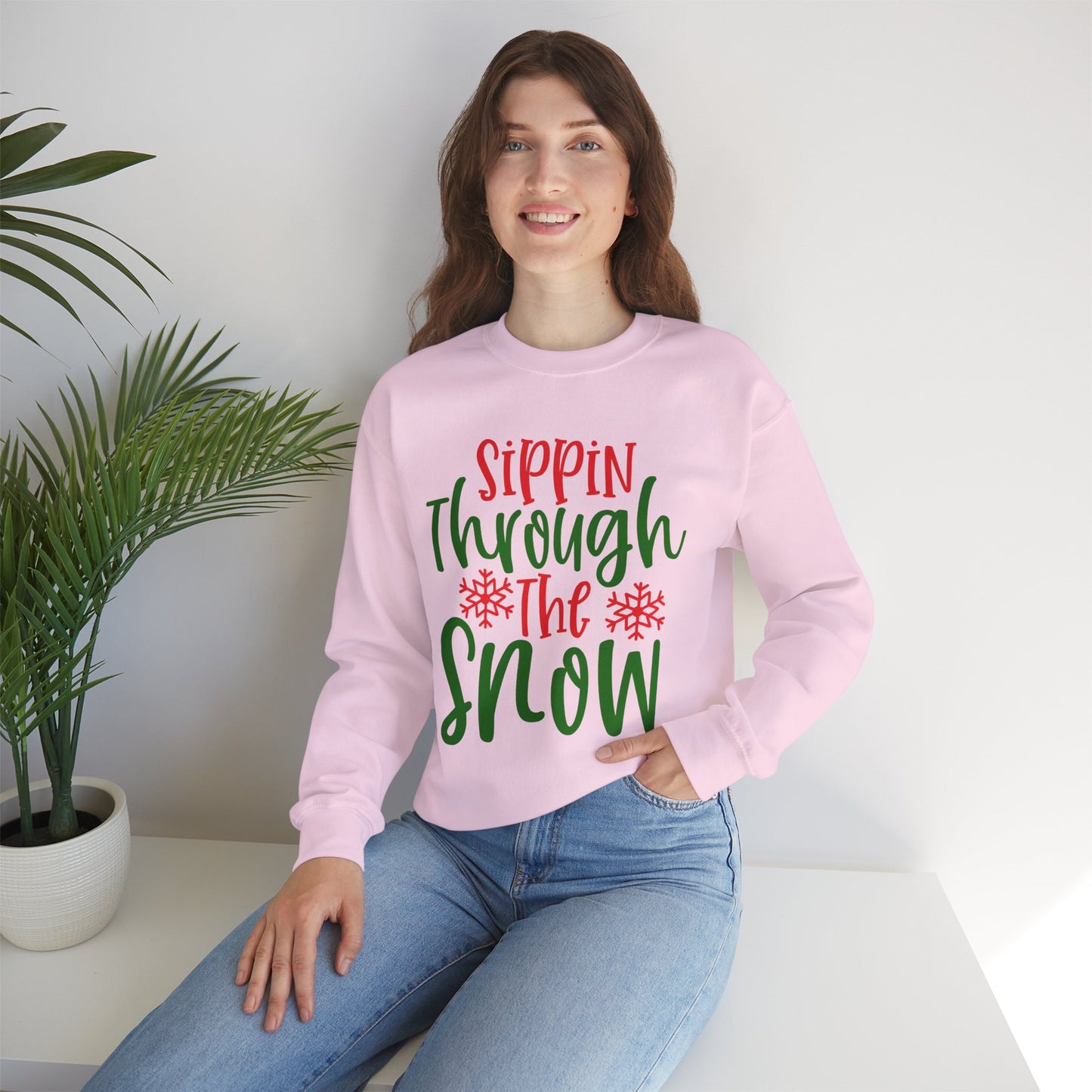 Sippin’ Through The Snow Sweatshirt – Festive Holiday Unisex Heavy Blend Crewneck