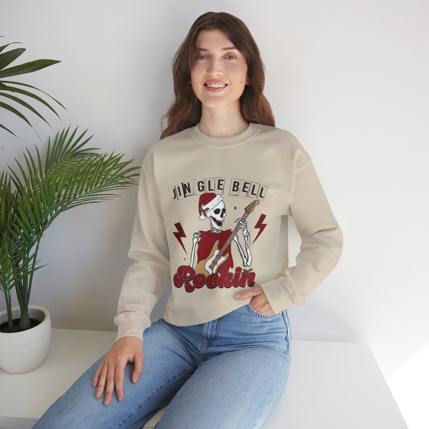 Jingle Bell Rockin’ Skeleton Christmas Rock Music Holiday Sweatshirt – Retro Guitar Santa Unisex Heavy Blend Crewneck