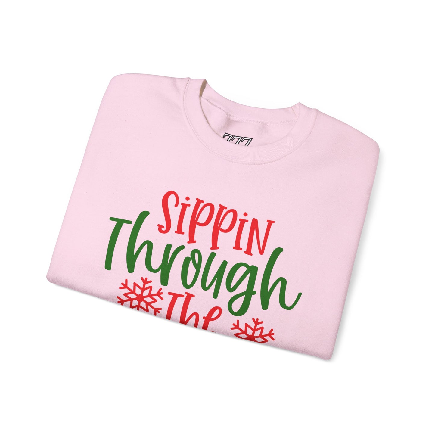 Sippin’ Through The Snow Sweatshirt – Festive Holiday Unisex Heavy Blend Crewneck