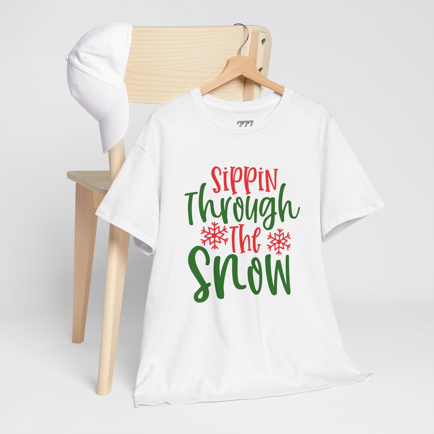 Sippin’ Through The Snow T-Shirt – Festive Holiday Beverage Unisex Heavy Cotton Tee
