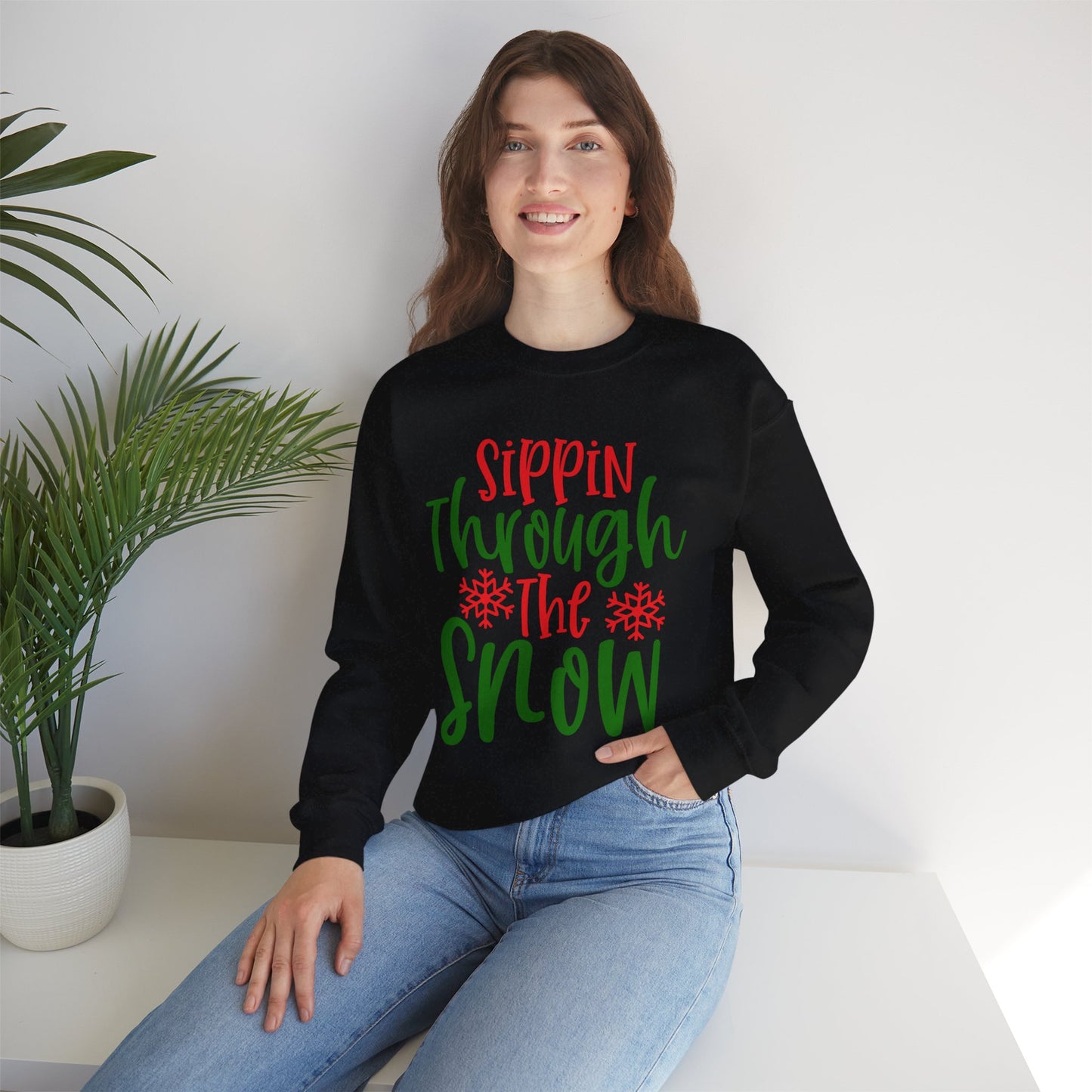 Sippin’ Through The Snow Sweatshirt – Festive Holiday Unisex Heavy Blend Crewneck
