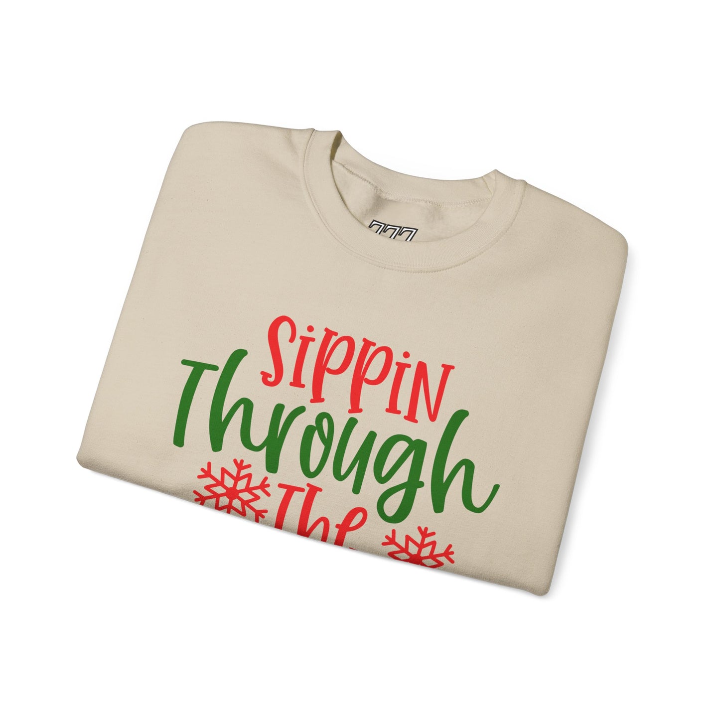 Sippin’ Through The Snow Sweatshirt – Festive Holiday Unisex Heavy Blend Crewneck