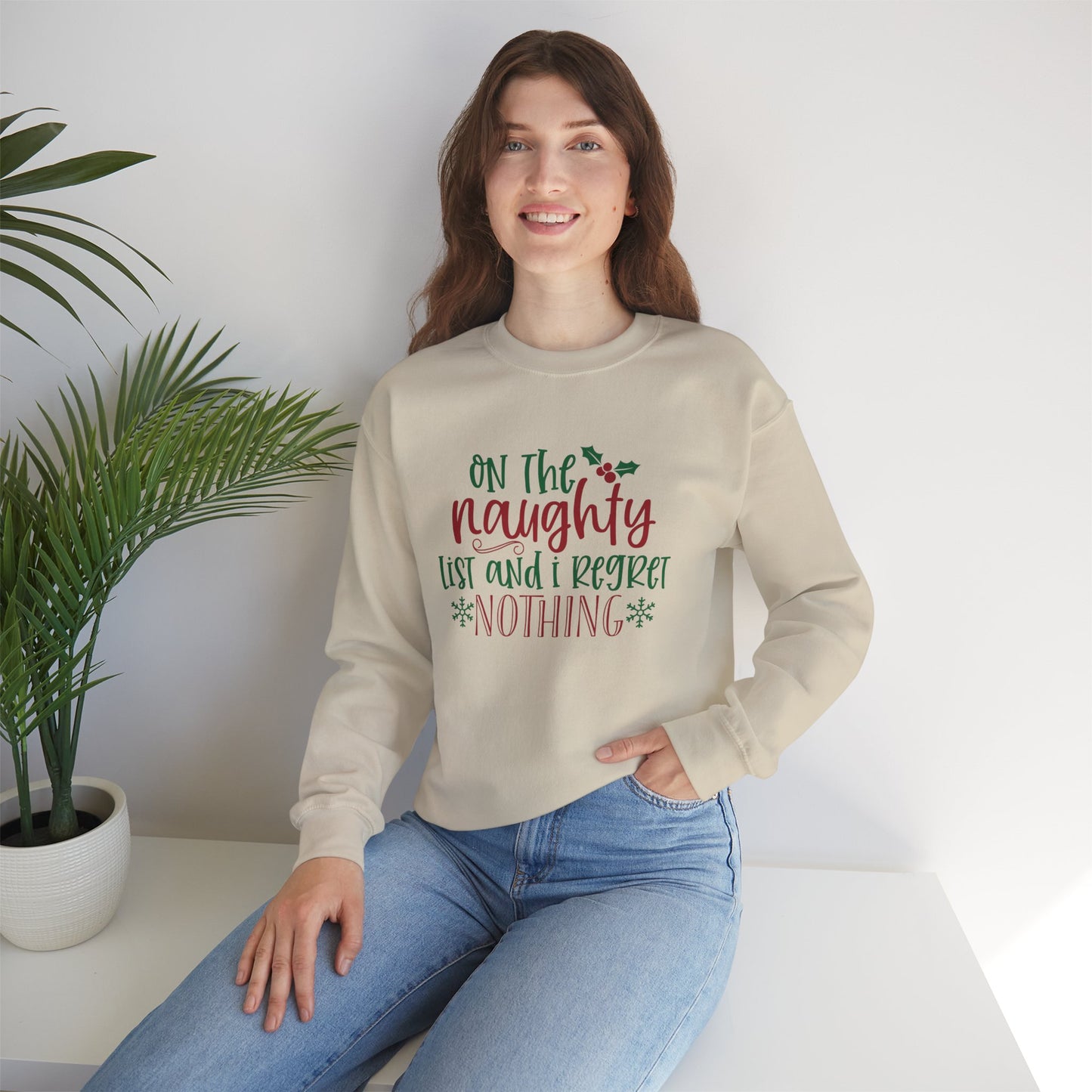 On The Naughty List And I Regret Nothing Unisex Heavy Blend Crewneck Sweatshirt