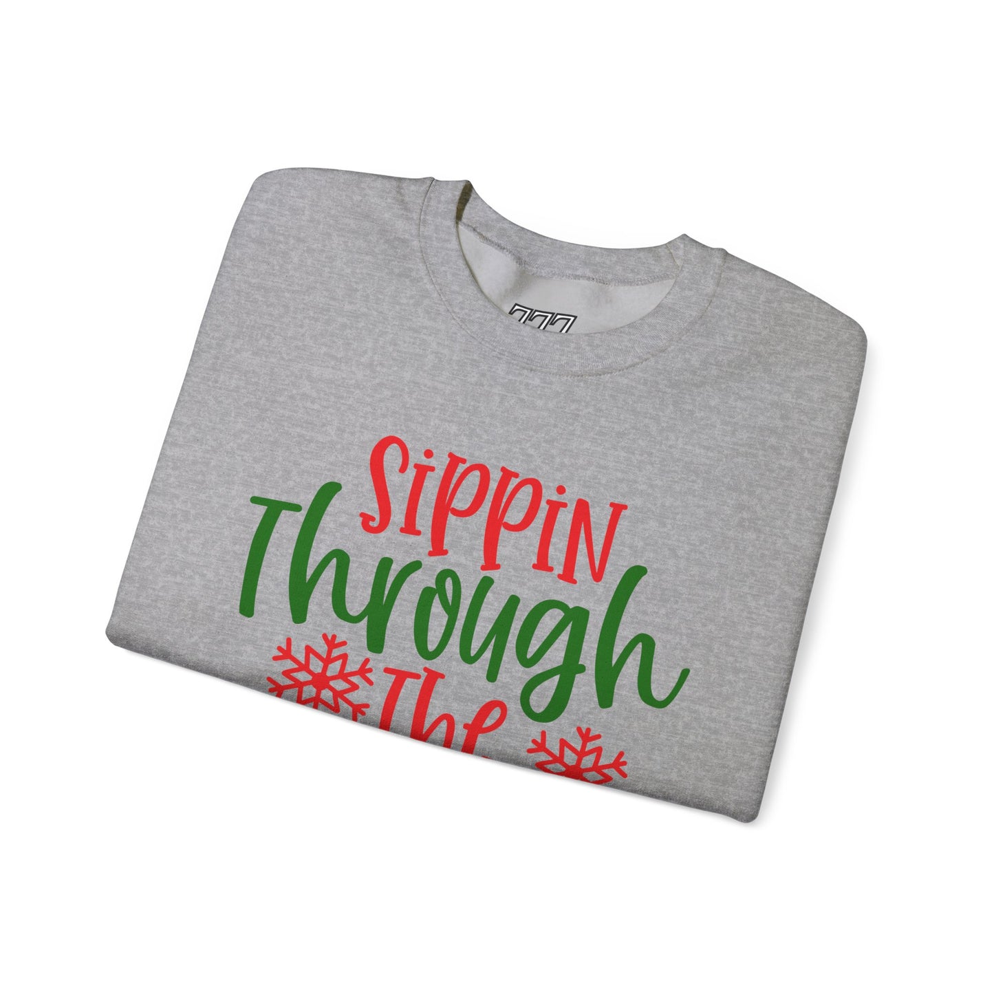 Sippin’ Through The Snow Sweatshirt – Festive Holiday Unisex Heavy Blend Crewneck