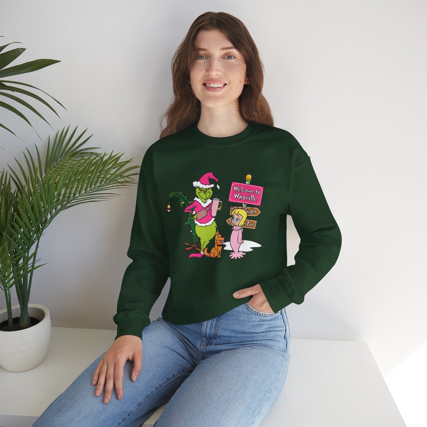 Welcome to Merryville Christmas Crewneck – Cute Green Creature & Winter Village Sweatshirt (Unisex)